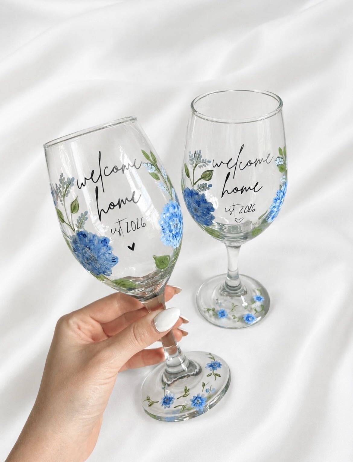 Hand-painted welcome home hydrangea wine glasses